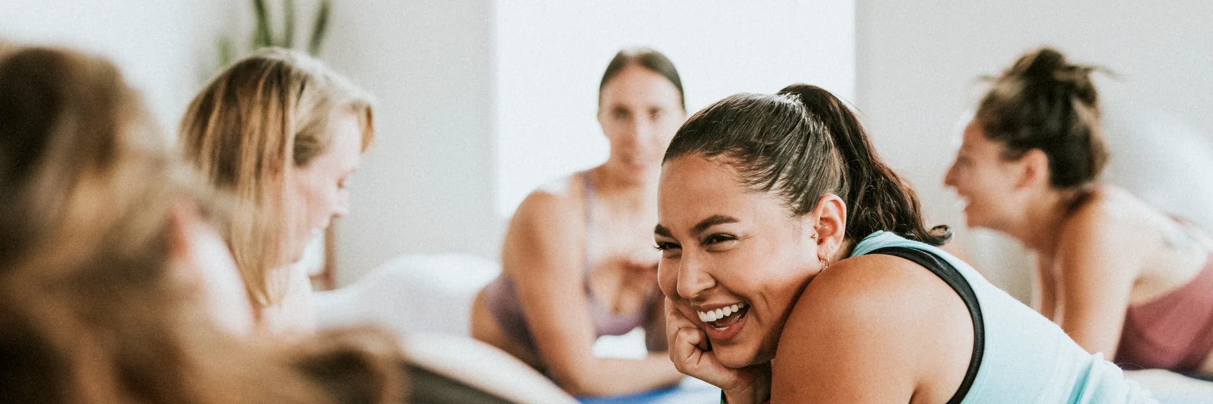 Women together in a bright, calm studio setting